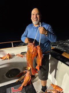 Junior with a nice stringer, including second largest fish.