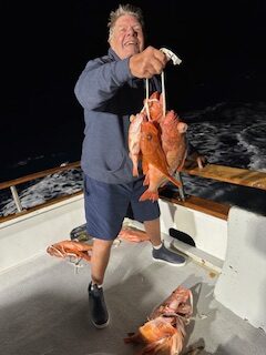 Happy Tom Hinmon with his nice catch.